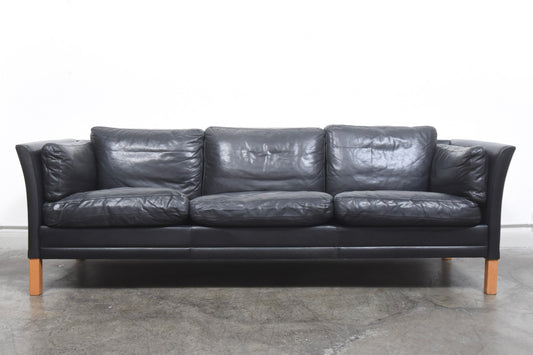 Black leather three seat sofa by Mogens Hansen