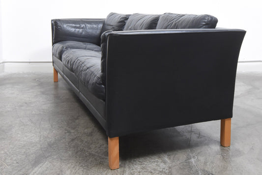 Black leather three seat sofa by Mogens Hansen