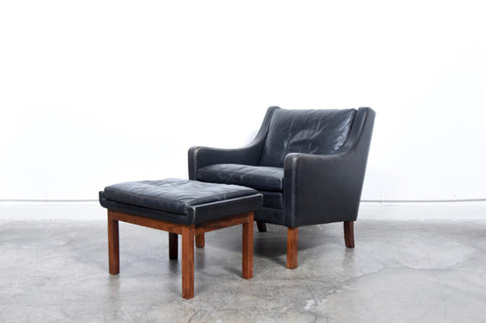 Leather club chair + matching foot stool
