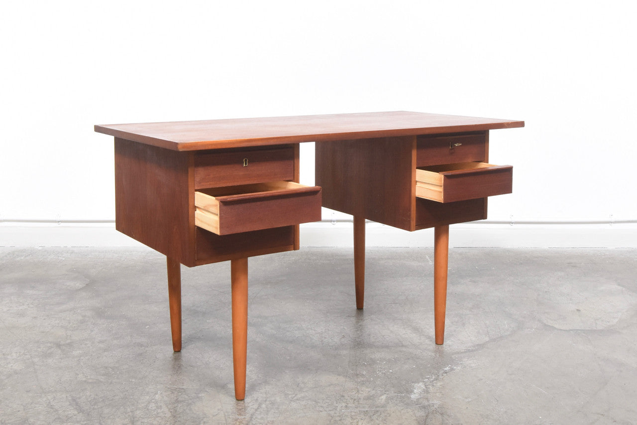 Twin pedestal desk in teak