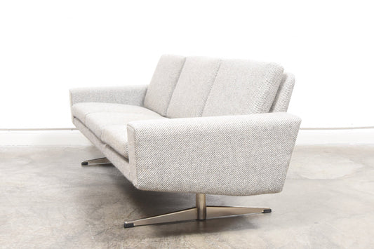 Grey wool sofa on shaker legs