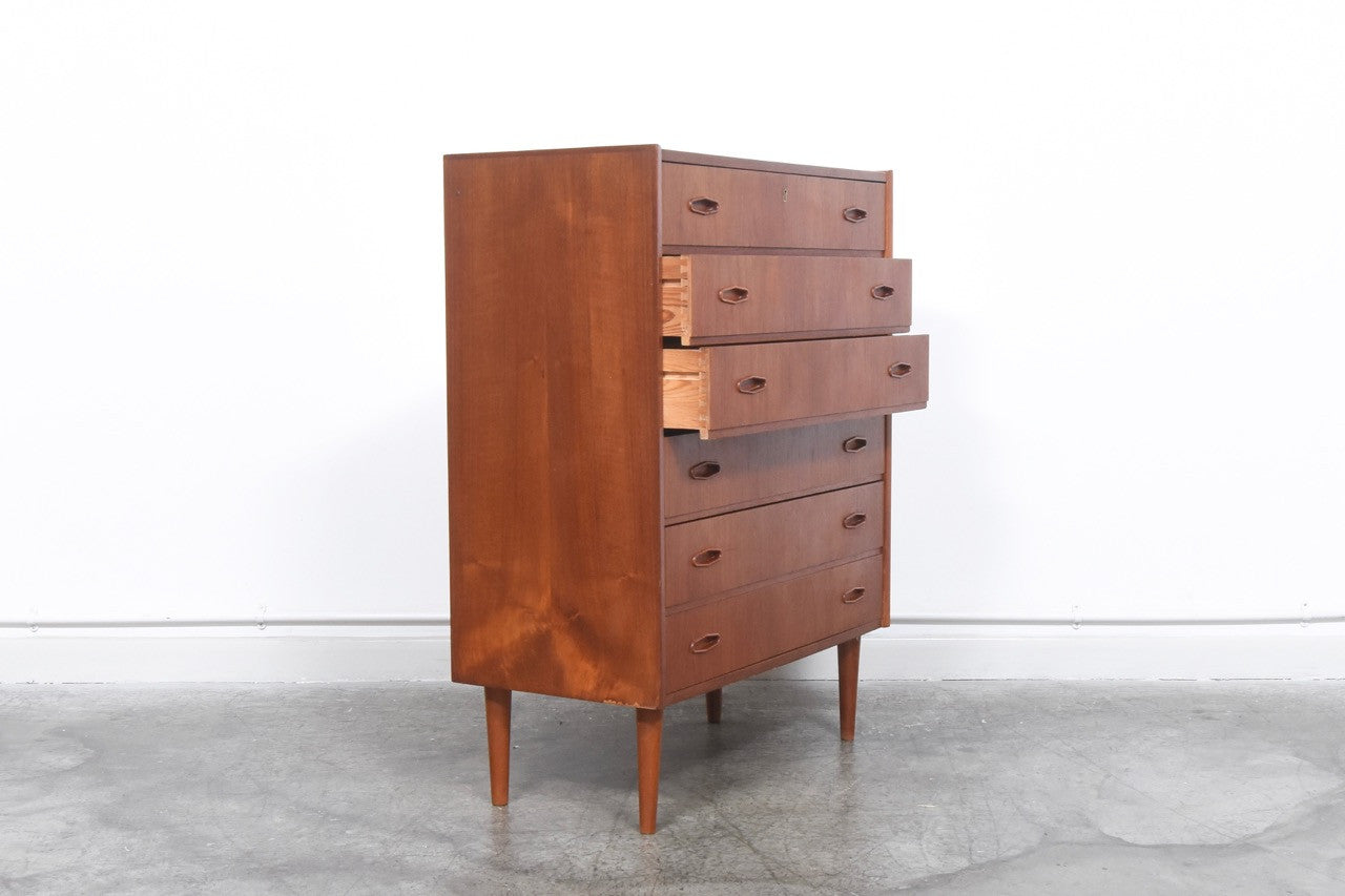 Teak chest of drawers with insert handles