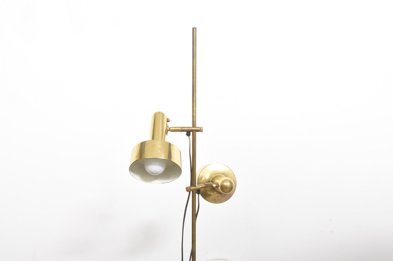 Twin headed brass floor lamp