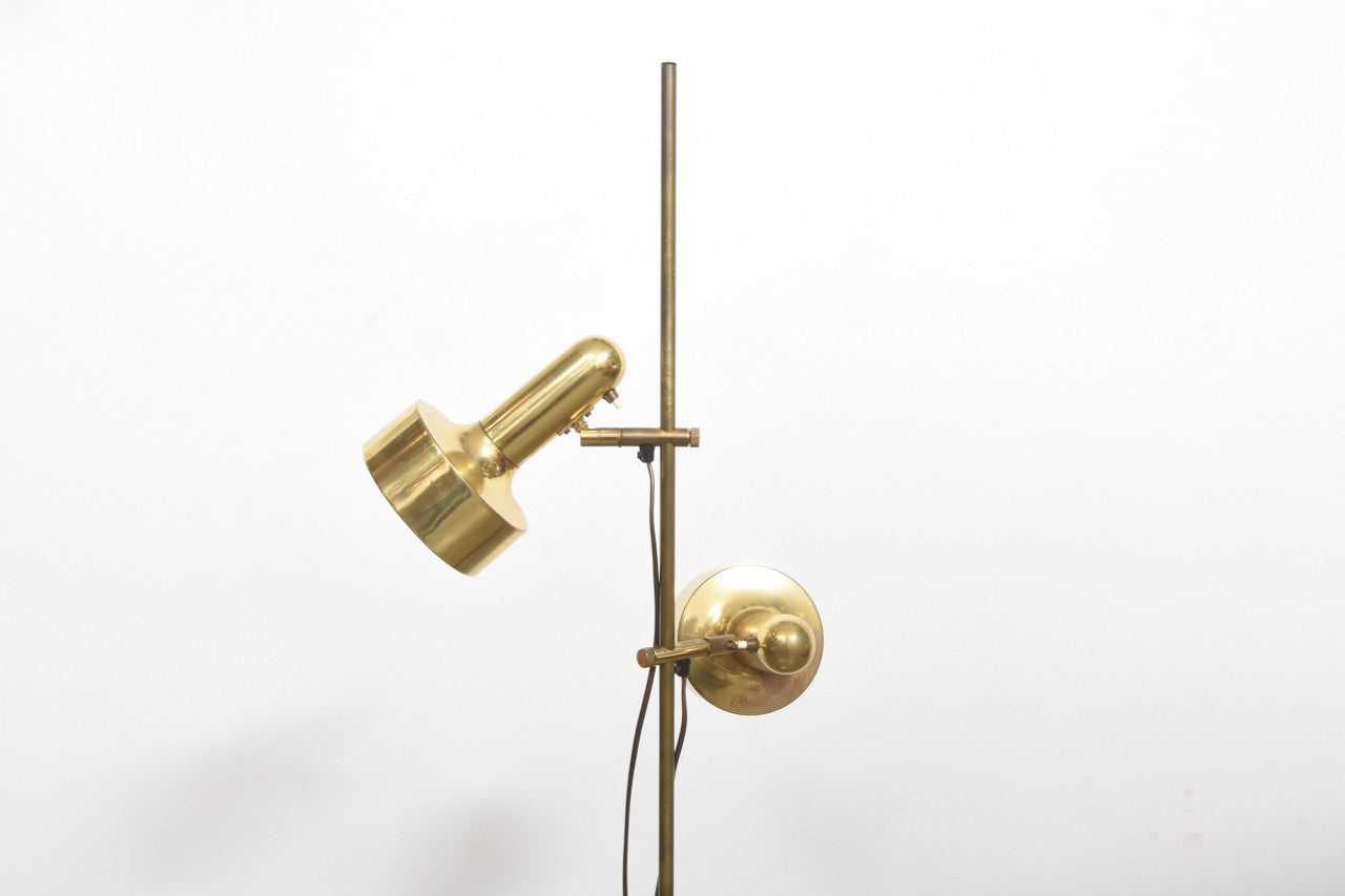 Twin headed brass floor lamp