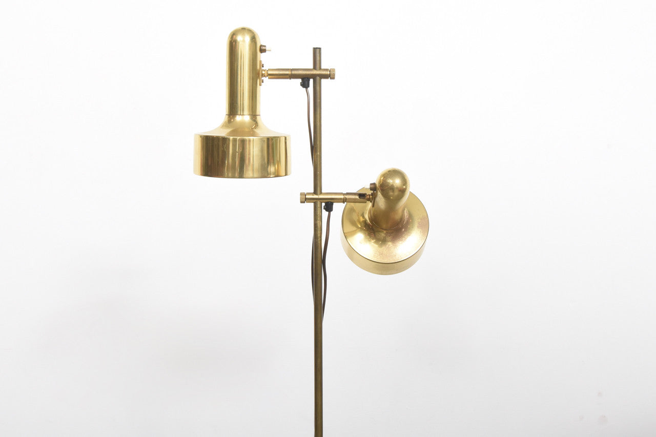 Twin headed brass floor lamp