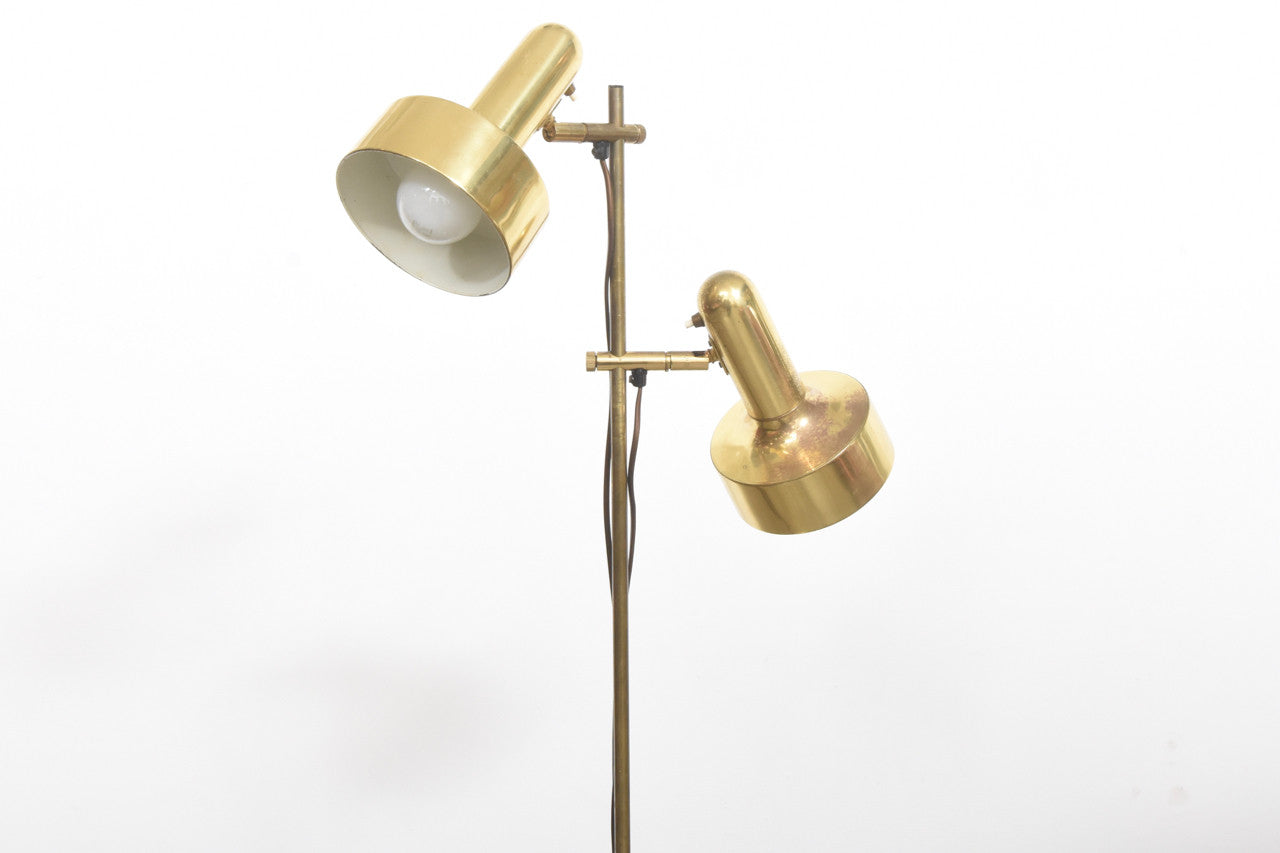 Twin headed brass floor lamp