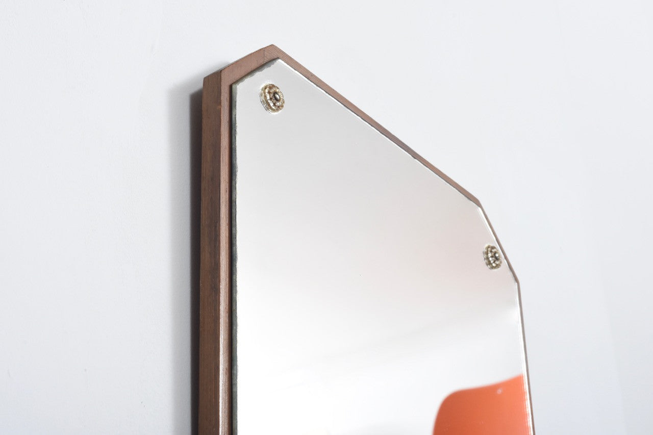 Mirror with cut corners