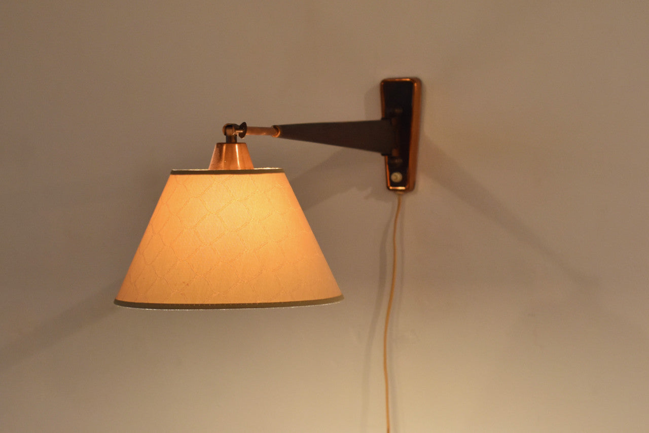 Wall light in rosewood and copper