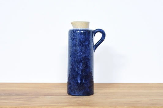 Stoneware jug with violet glaze