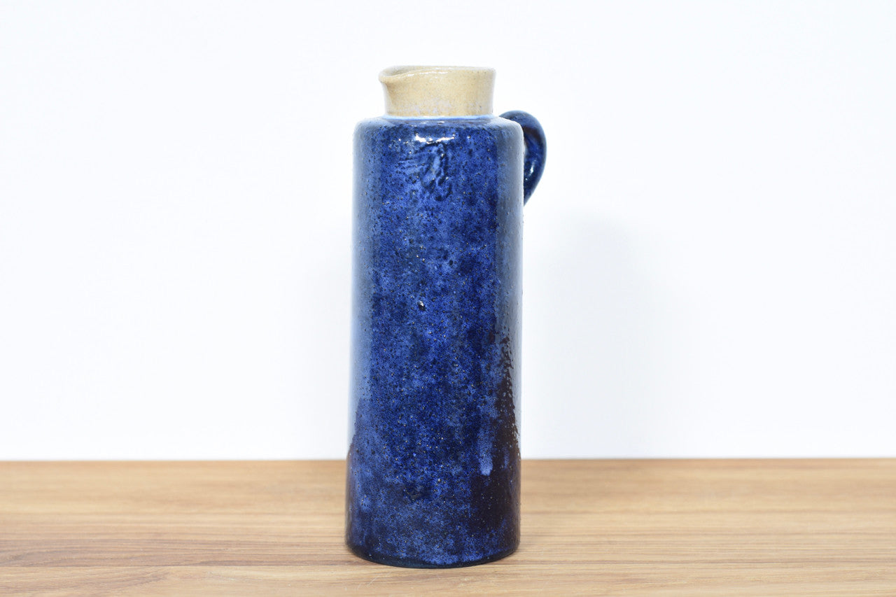 Stoneware jug with violet glaze