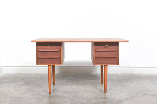 Twin pedestal desk in teak