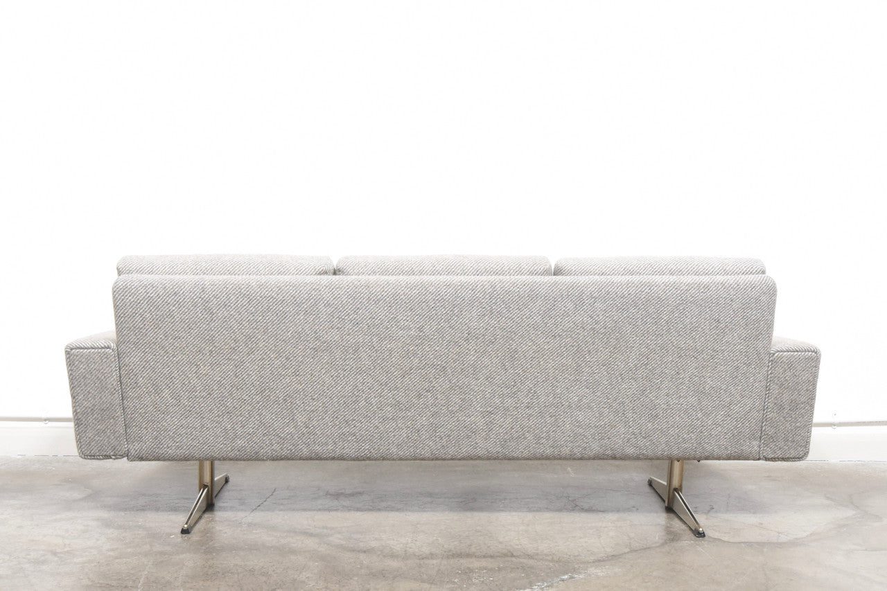 Grey wool sofa on shaker legs