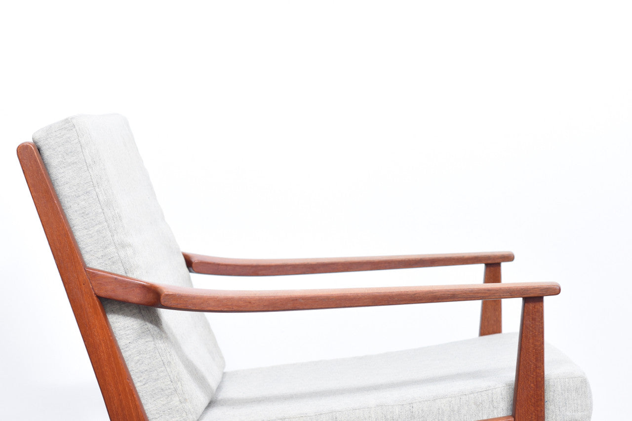 1960s teak lounge chair with grey cushions