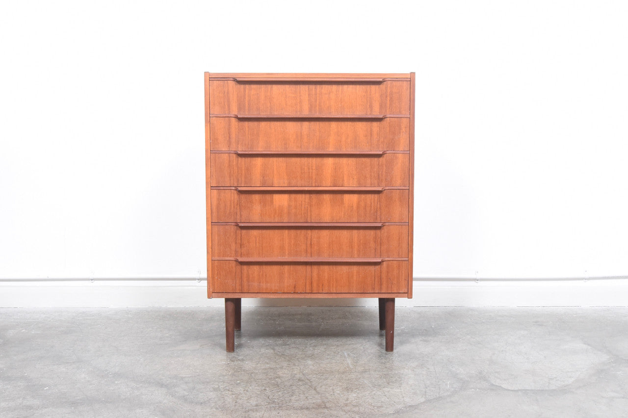 Teak chest of drawers with lipped handles