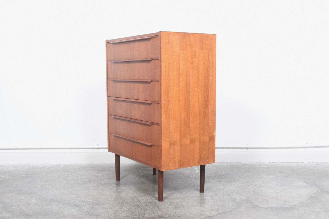 Teak chest of drawers with lipped handles