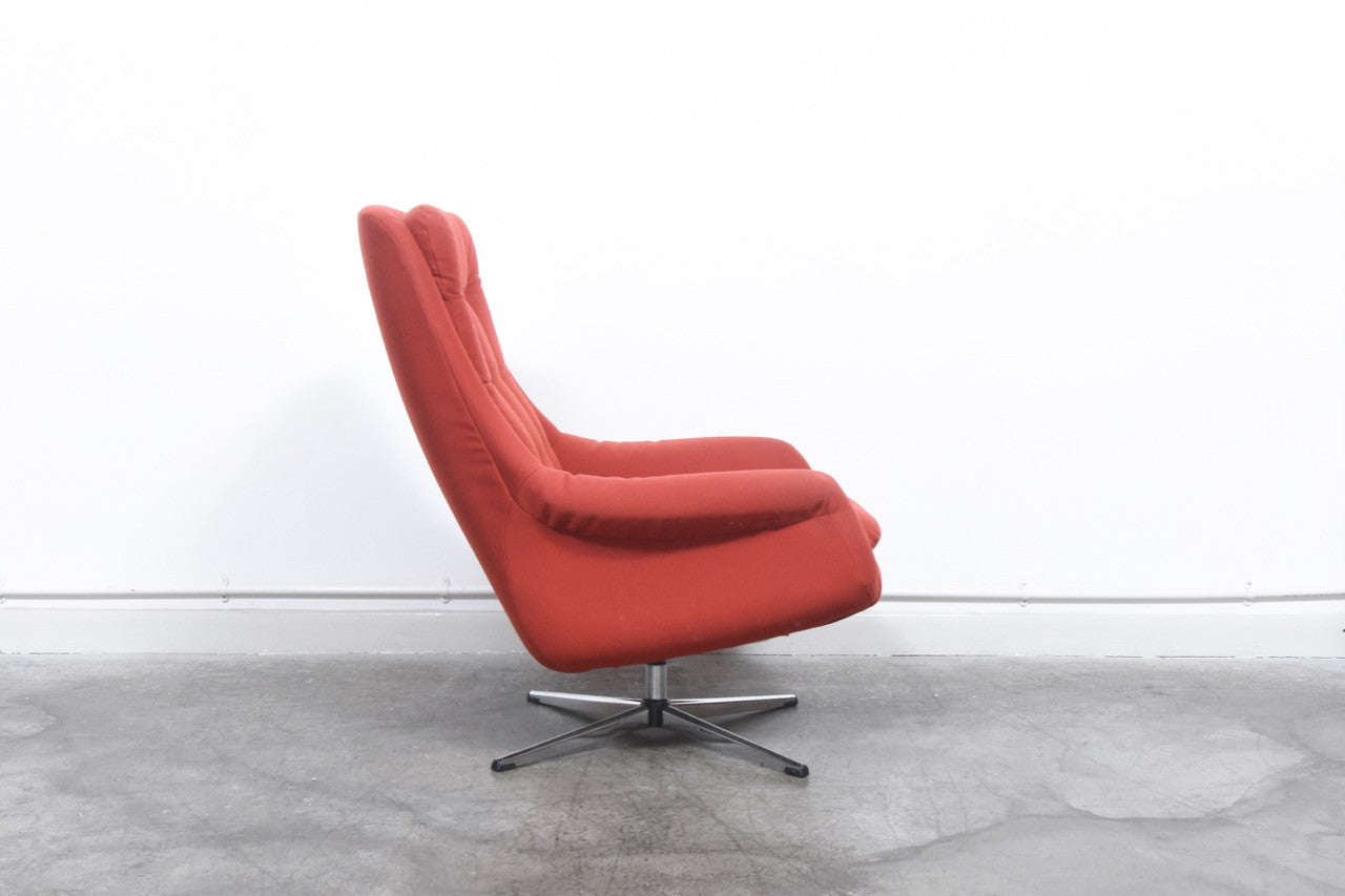 Red fabric swivel chair