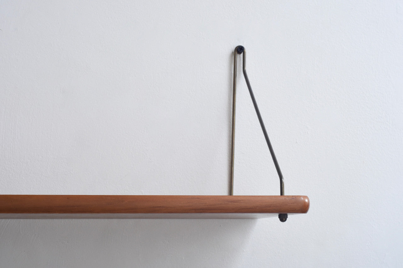 Floating shelf in teak with rounded edges