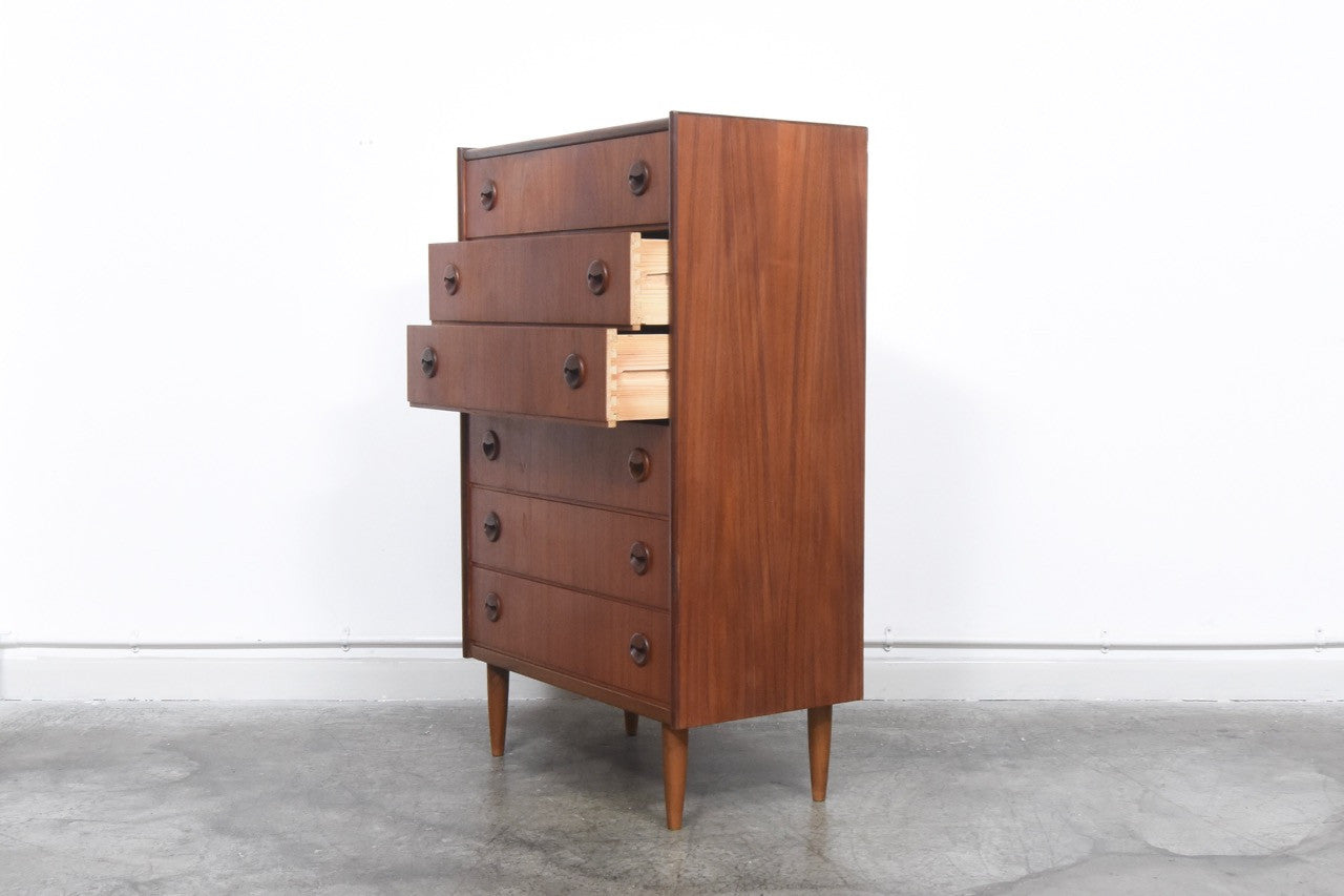 Tall teak chest of drawers