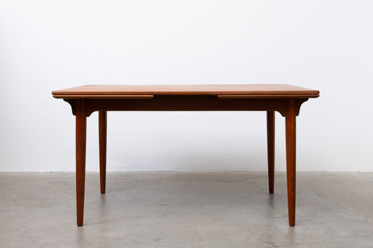 Extending teak dining table by Omann Jun