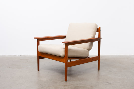 1960s teak lounger with linen cushions