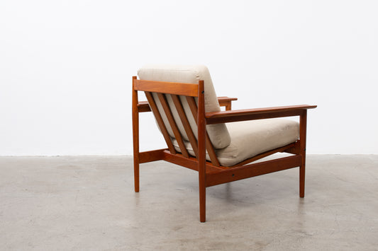 1960s teak lounger with linen cushions