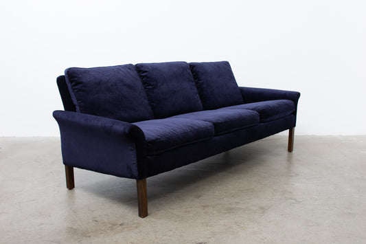 Newly upholstered: 1960s three seater in navy corduroy