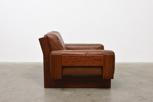 Model 1001 leather + oak lounger by Bruksbo