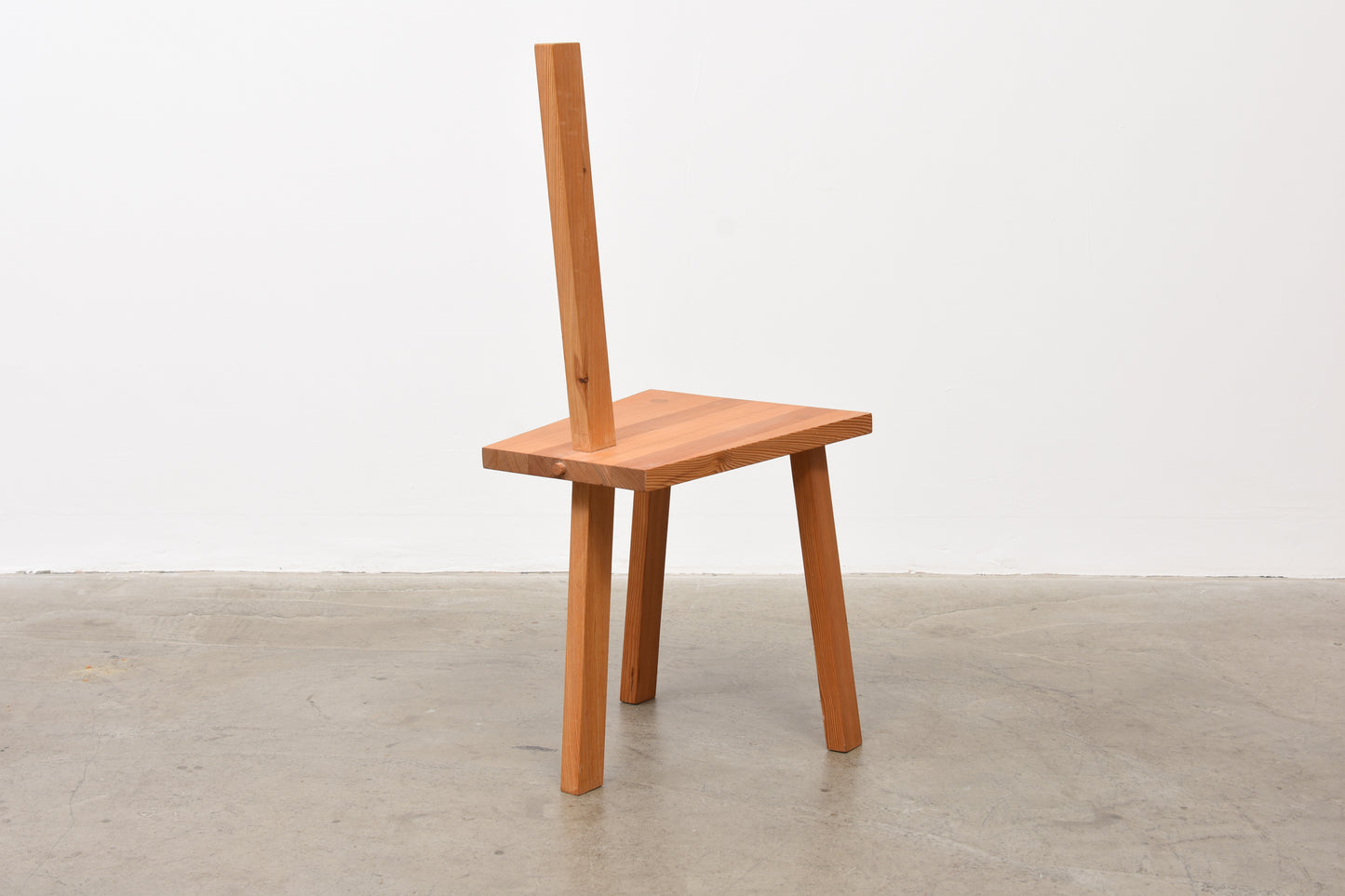 Three-legged Swedish pine chair