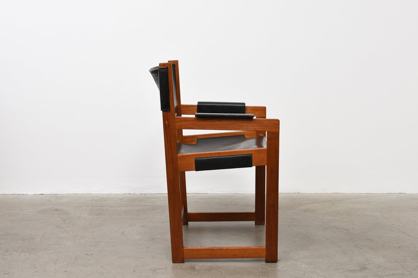 Two available: Teak + leather armchairs by Sven-Kai Larsen