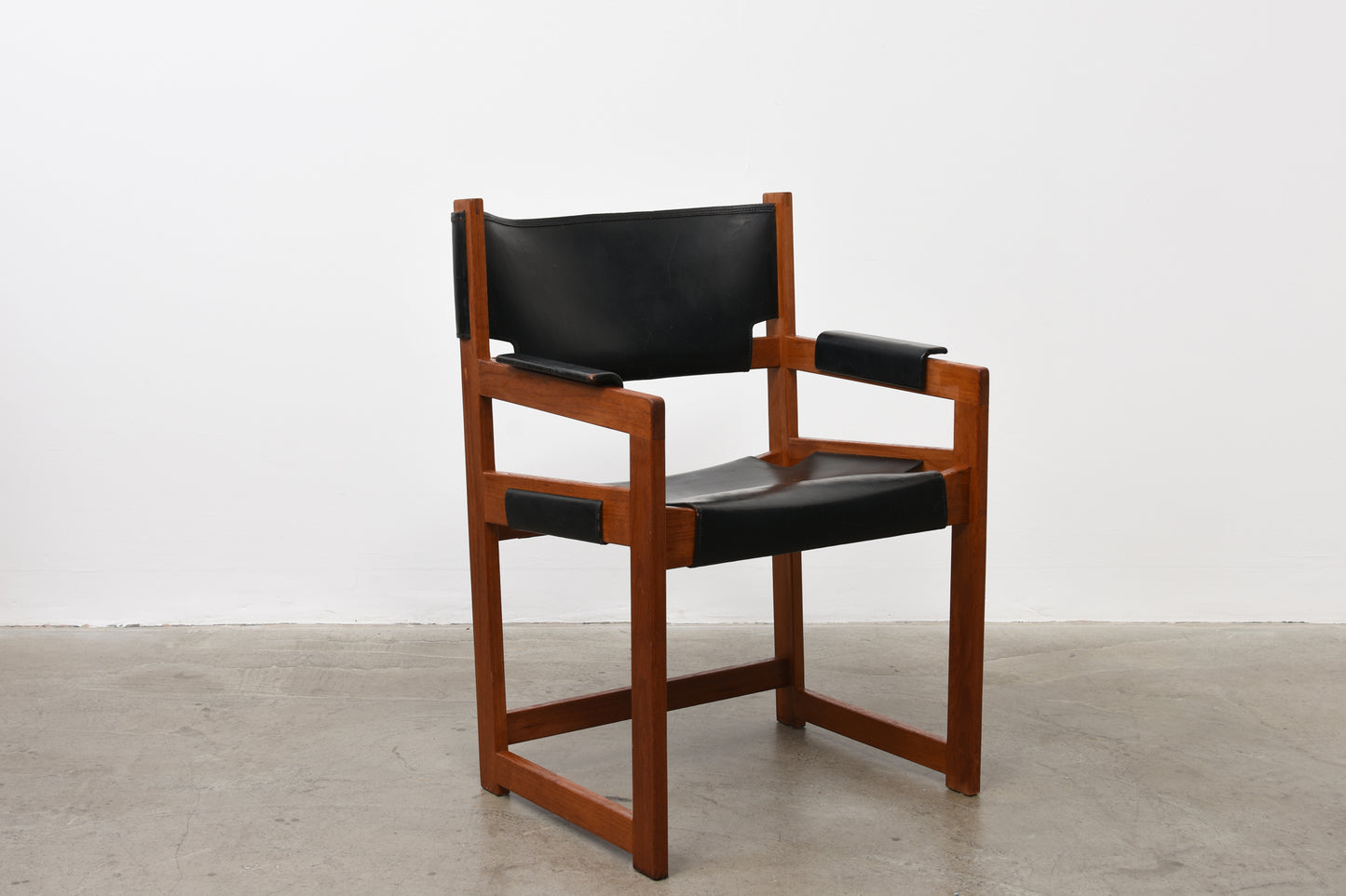 Two available: Teak + leather armchairs by Sven-Kai Larsen