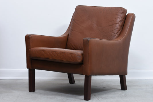 Chocolate leather club chair