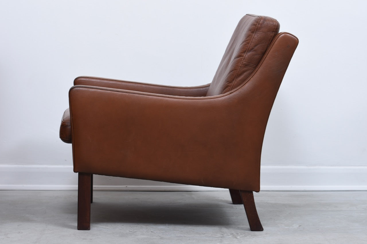 Chocolate leather club chair