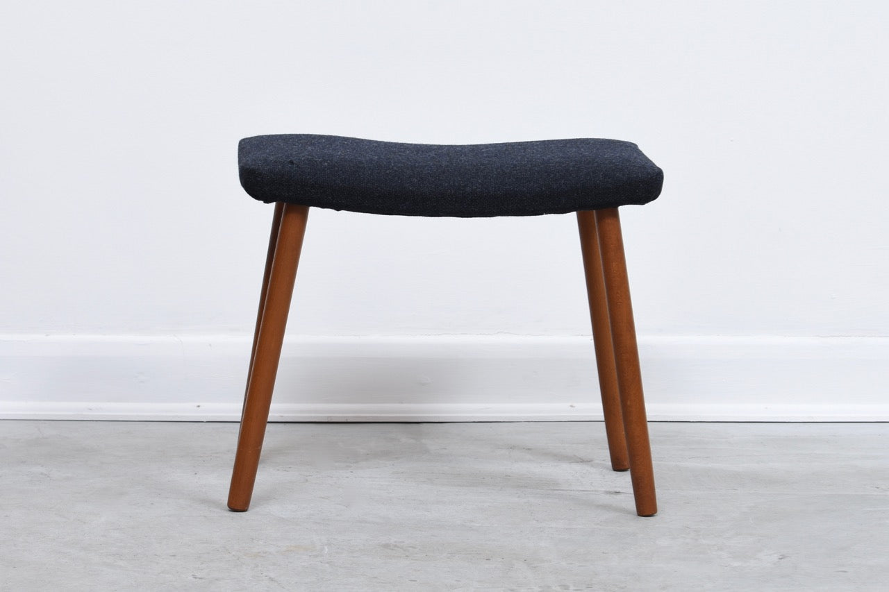 Beech foot stool with new wool uphostery