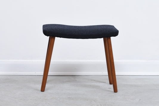 Beech foot stool with new wool uphostery