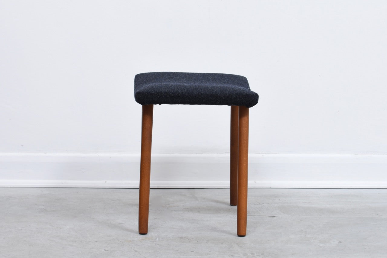 Beech foot stool with new wool uphostery