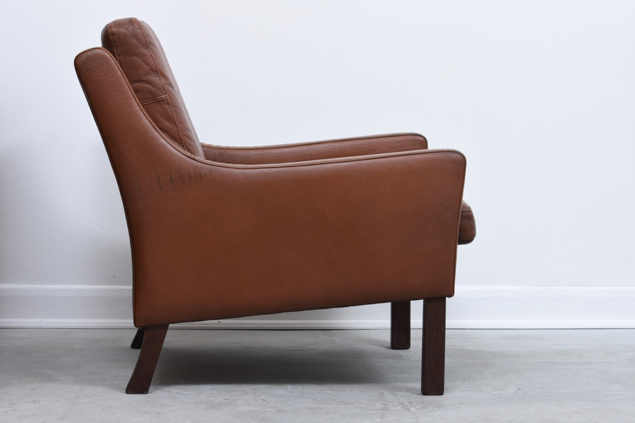 Chocolate leather club chair