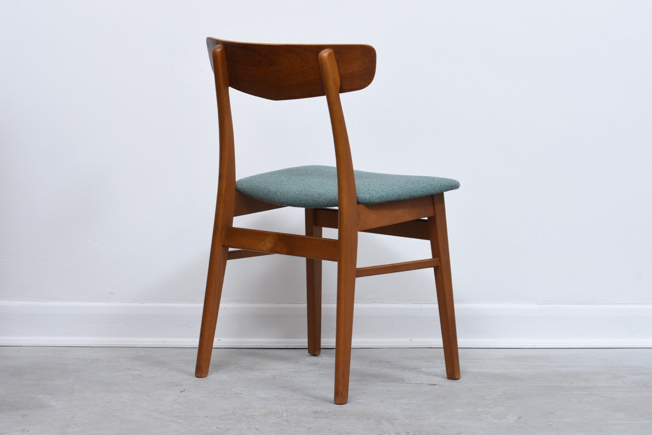 Set of four teak dining chairs