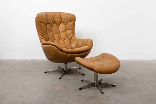 1960s leather swivel chair with foot stool