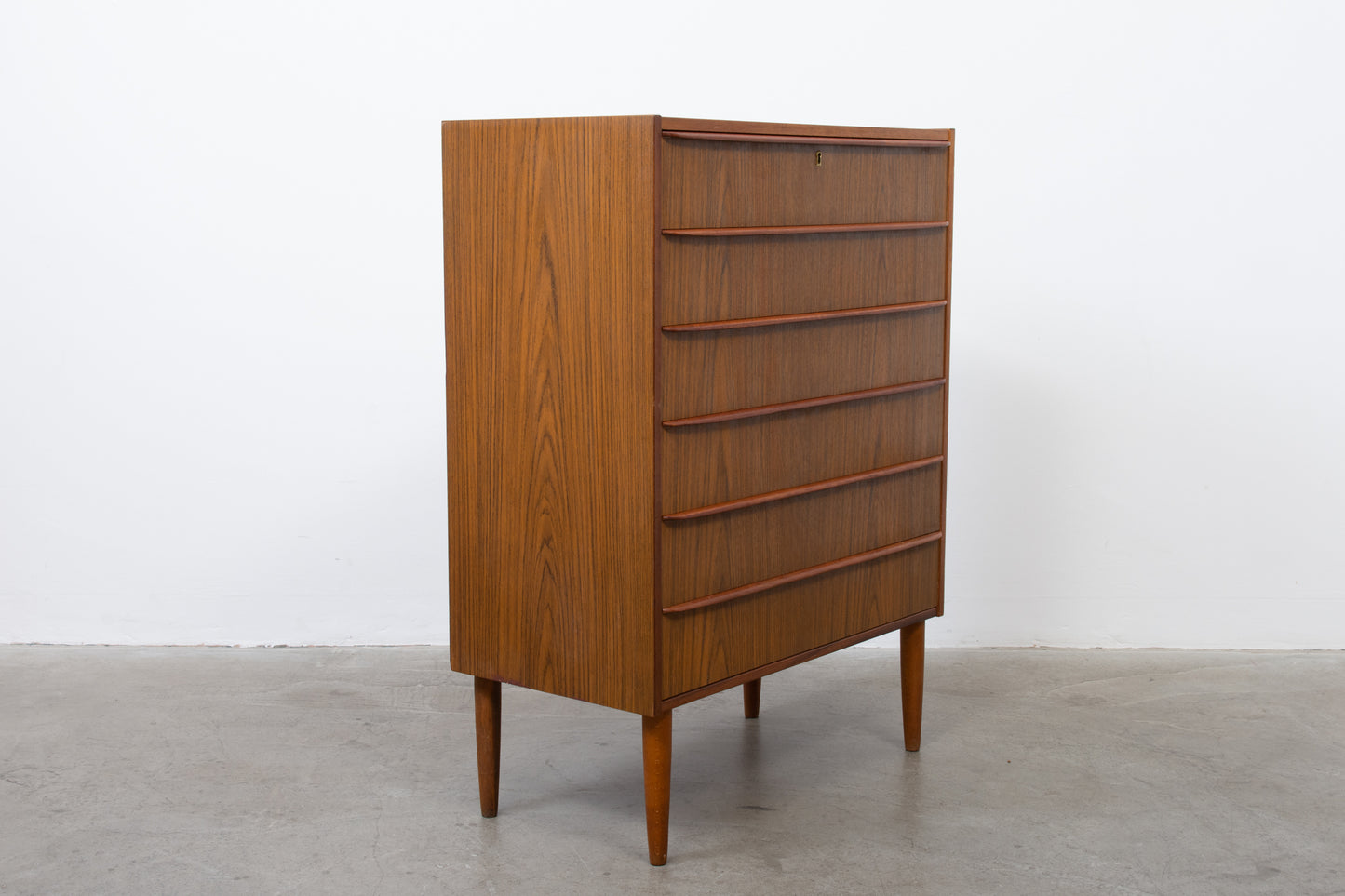 1960s rosewood + teak chest of drawers