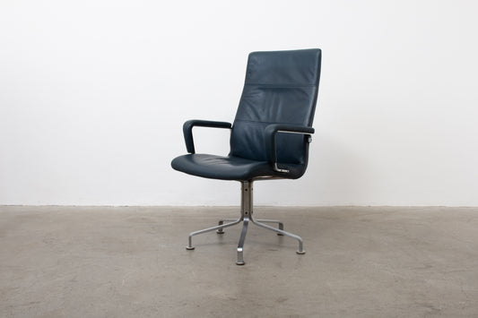 Four available: 1980s leather + steel armchairs by Arne Vodder