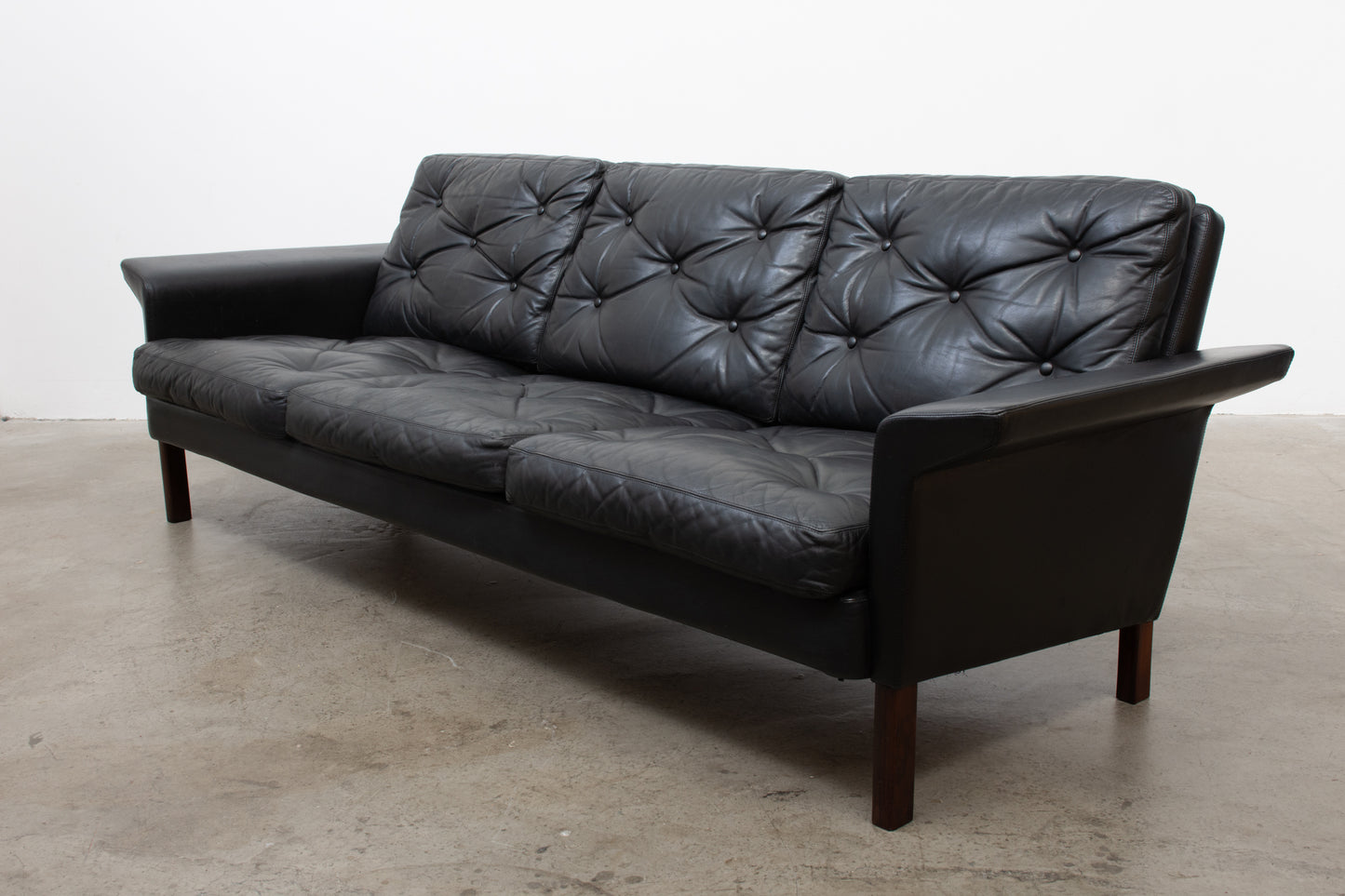 1960s leather sofa on rosewood legs