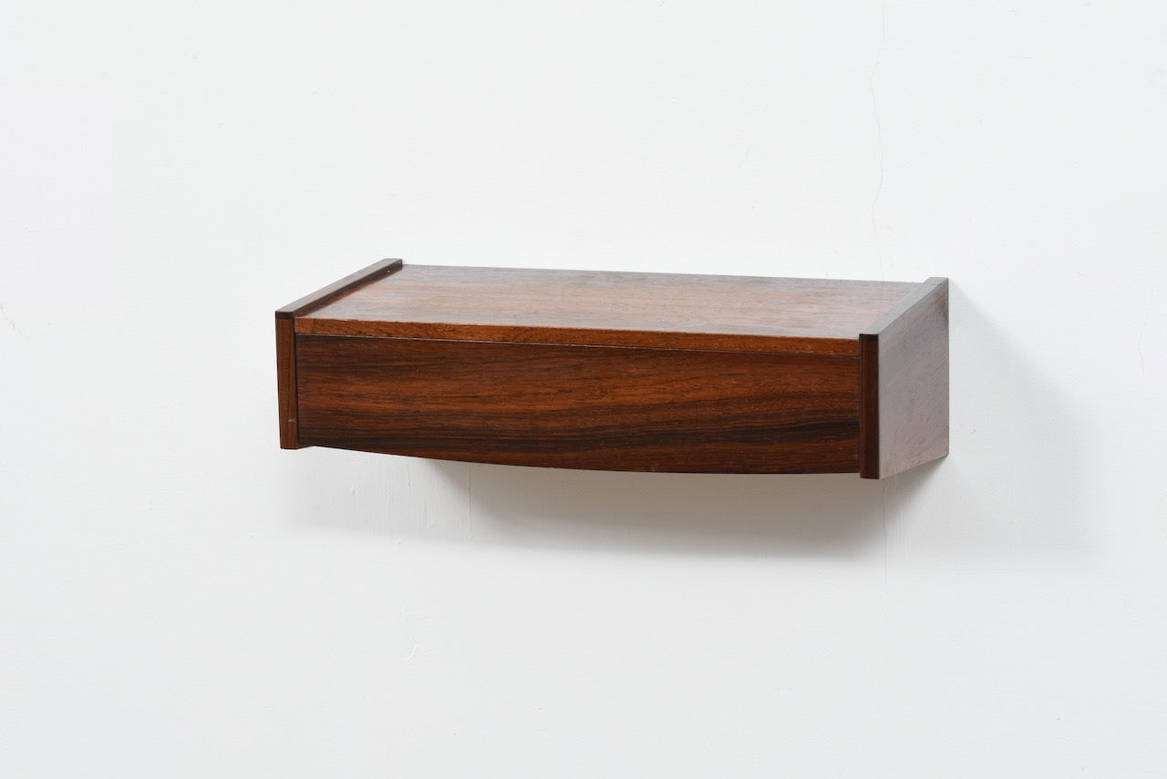 Floating drawer in rosewood