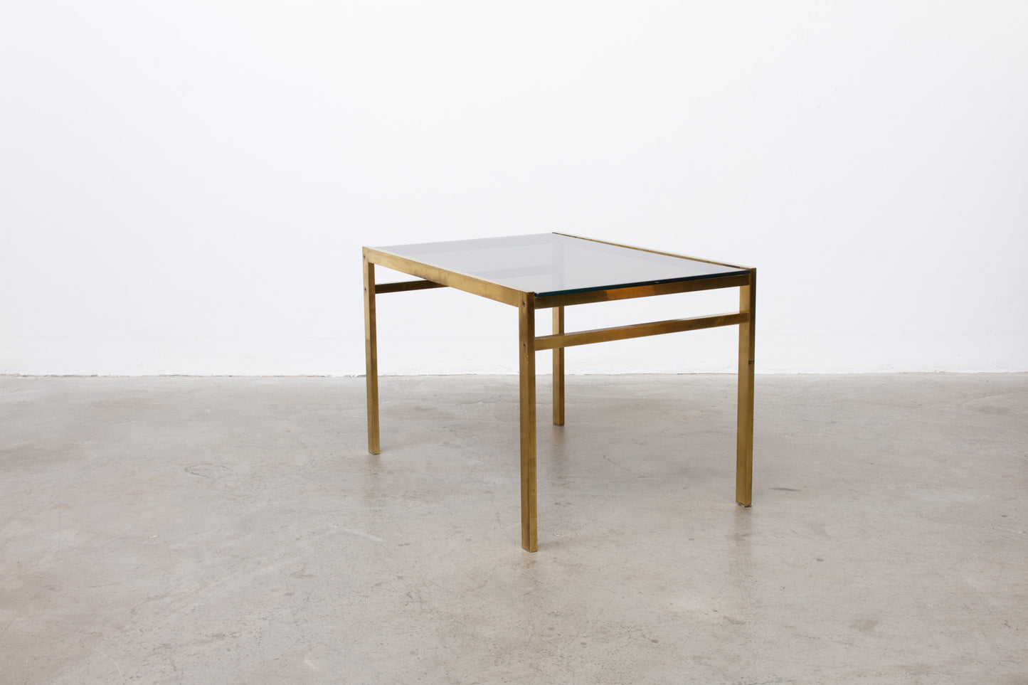 Two available: 1970s brass + smoked glass tables