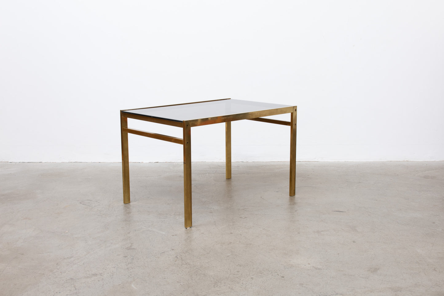 Two available: 1970s brass + smoked glass tables