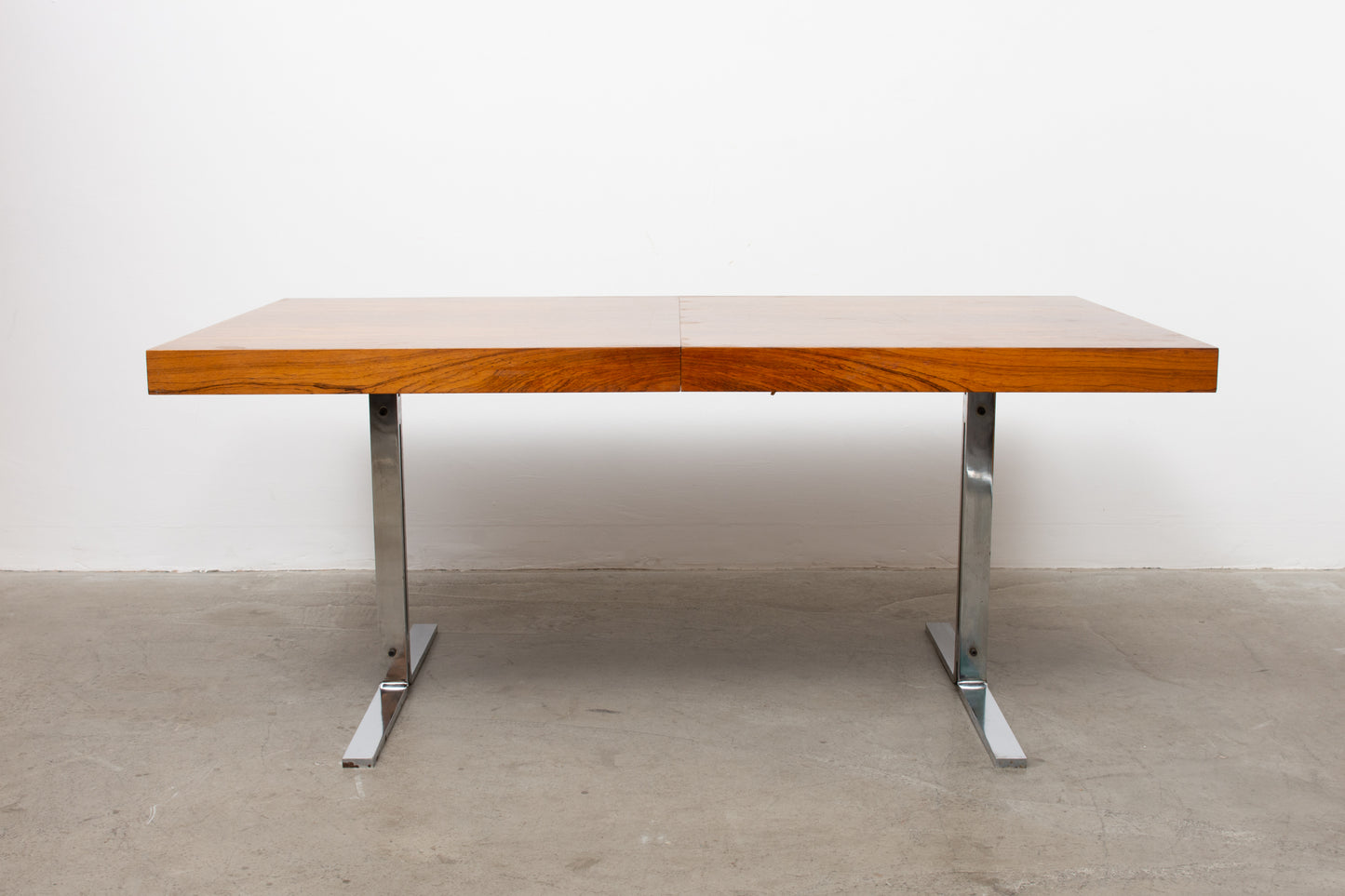1970s rosewood + steel dining table by Poul Nørreklit
