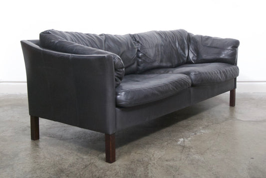 Two and a half seat leather sofa