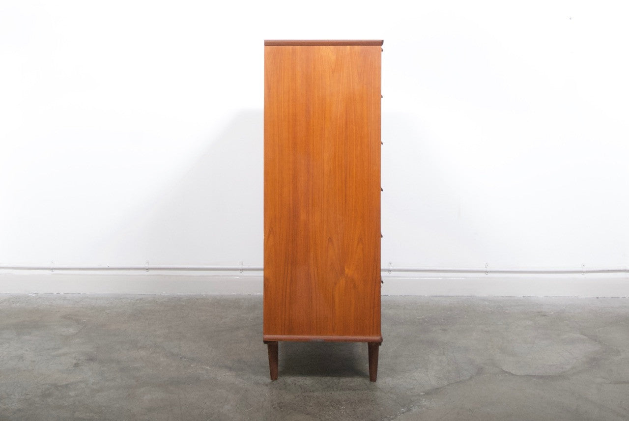 Large chest of teak drawers