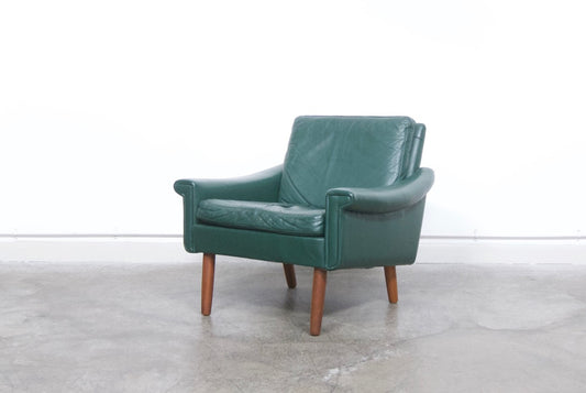 Low back green leather lounge chair