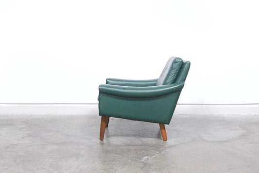 Low back green leather lounge chair