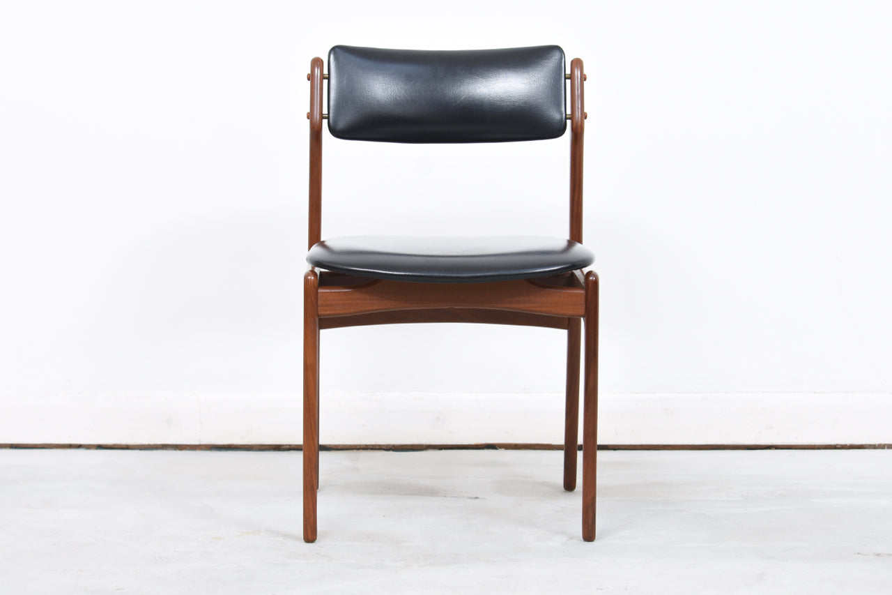 Six available: Teak + skai dining chairs